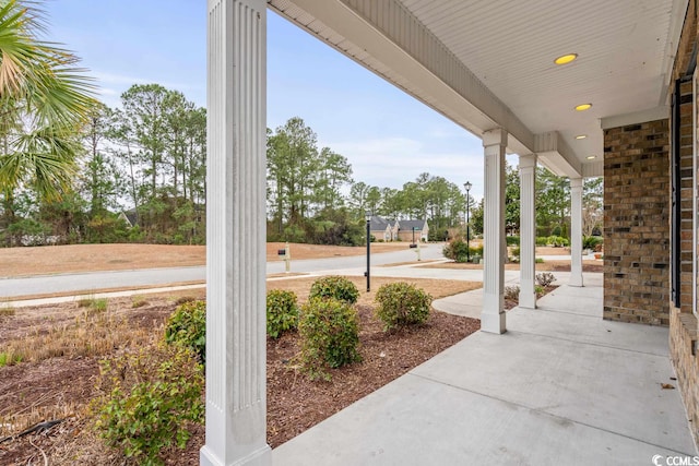 view of terrace featuring covered porch