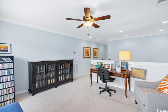 carpeted office featuring ceiling fan and crown molding