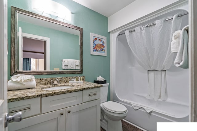 full bathroom with toilet, vanity, shower / tub combo with curtain, and wood-type flooring