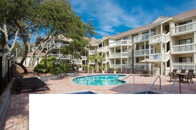 view of pool with a patio