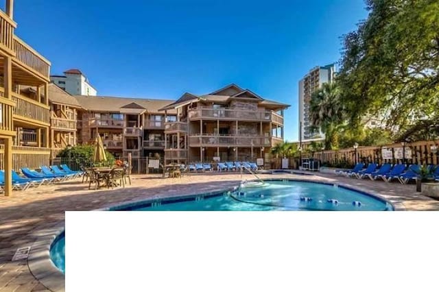 view of pool with a patio