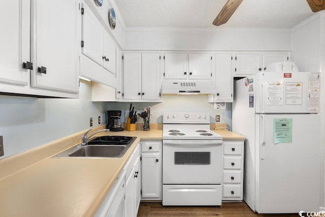 kitchen featuring ceiling fan, white appliances, sink, white cabinets, and dark hardwood / wood-style flooring