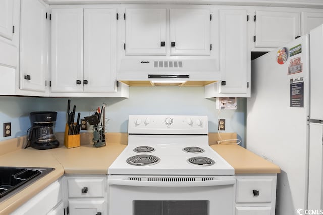 kitchen featuring white cabinets and white appliances