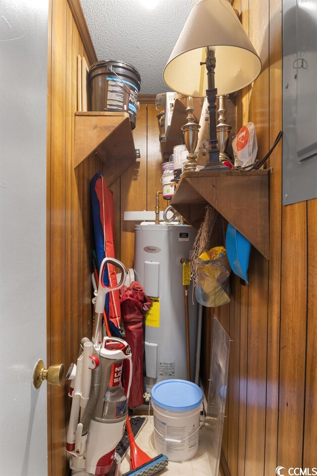 utility room with water heater