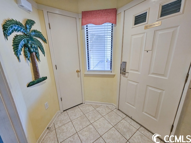 entryway featuring light tile flooring