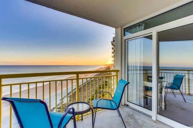 balcony at dusk with a water view