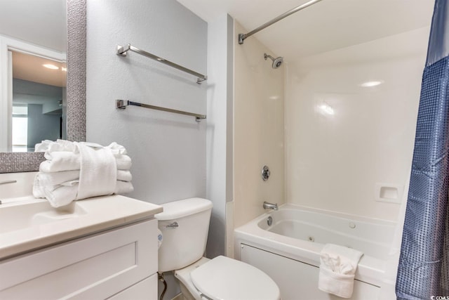 full bathroom with shower / bath combo with shower curtain, toilet, and vanity