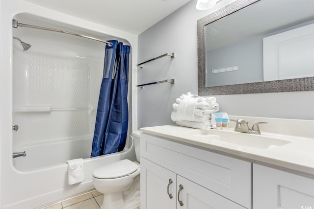 full bathroom with large vanity, toilet, shower / bath combo, and tile floors