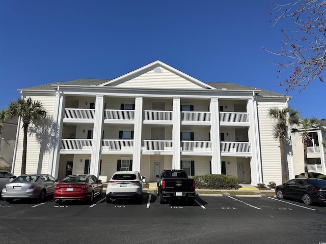 5020 Windsor Green Way Unit 103, Myrtle Beach, SC 29579 - view of building exterior featuring uncovered parking