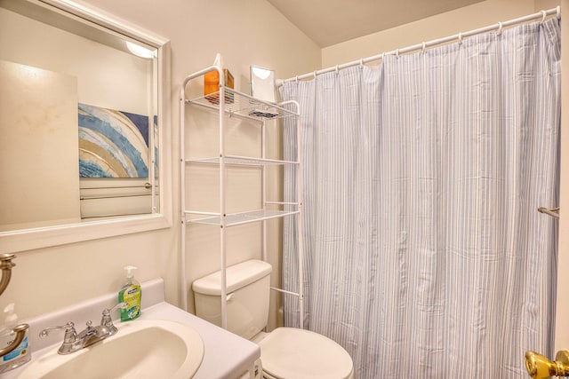 bathroom featuring sink and toilet