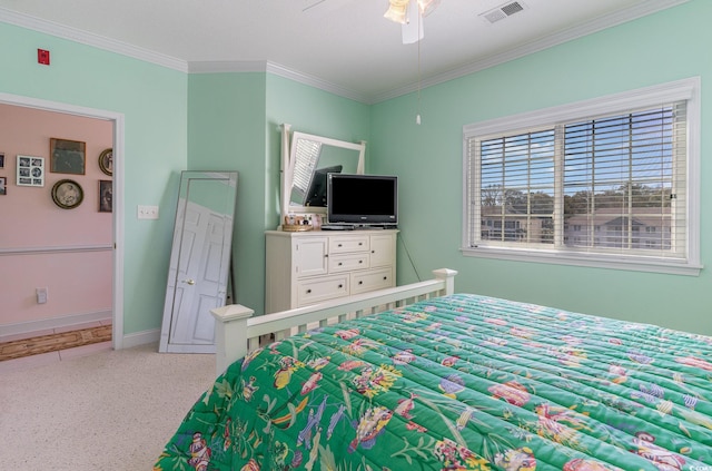 bedroom with ceiling fan and ornamental molding