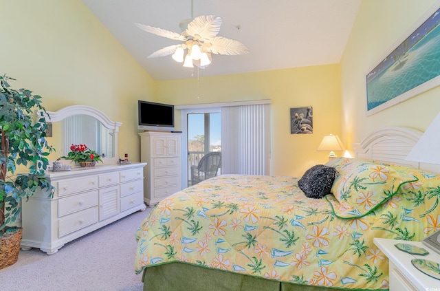 carpeted bedroom featuring access to outside, lofted ceiling, and ceiling fan