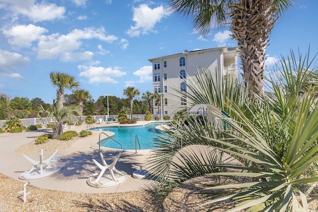 view of pool featuring a patio area