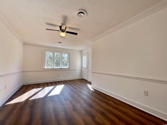 unfurnished room with ceiling fan, ornamental molding, dark hardwood / wood-style floors, and a textured ceiling