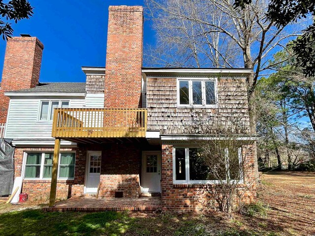 view of front of property with a patio