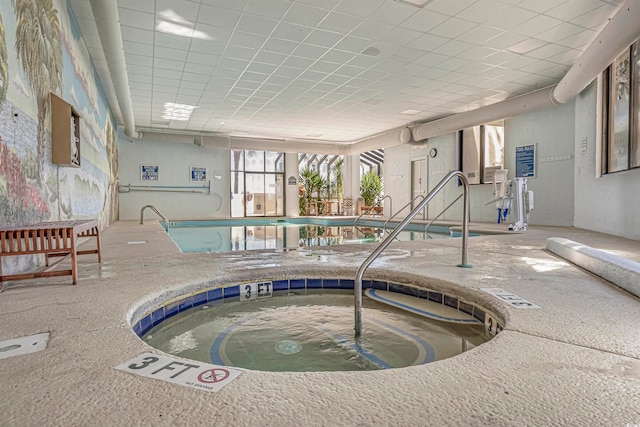 view of pool with an indoor in ground hot tub