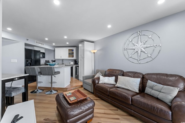 living room featuring light hardwood / wood-style flooring