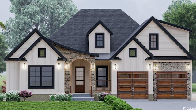 view of front facade featuring stone siding, an attached garage, and a shingled roof