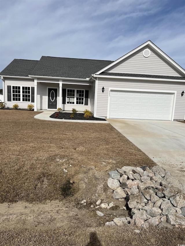 single story home featuring a garage, driveway, and roof with shingles