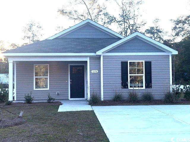 view of front of property featuring covered porch