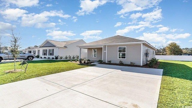 ranch-style house with a front lawn