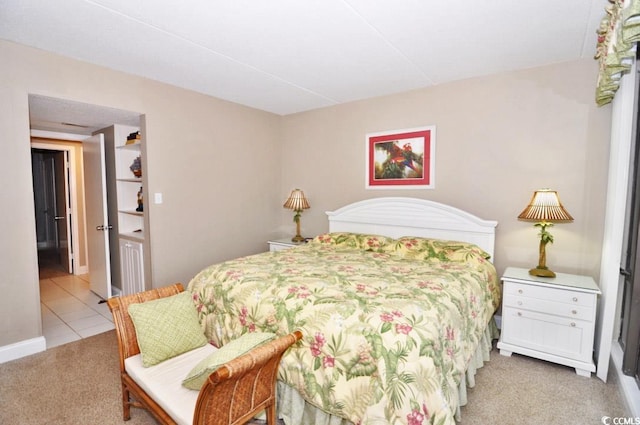 bedroom with light tile flooring