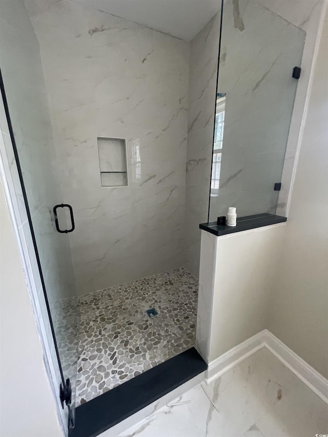 721 10th Ave S, Surfside Beach, SC 29575 - bathroom with a marble finish shower and marble finish floors