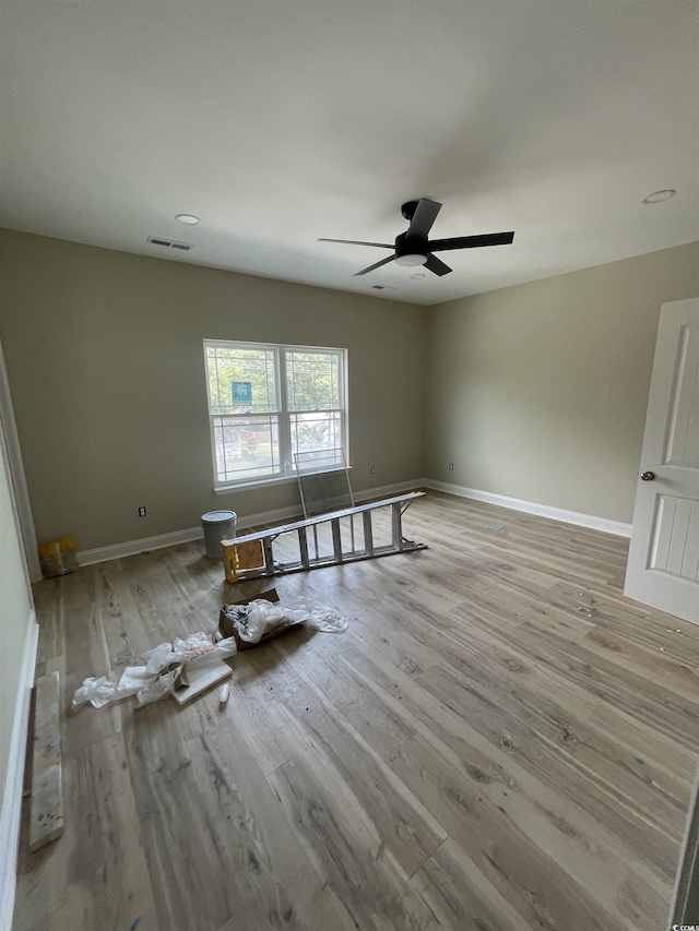 721 10th Ave S, Surfside Beach, SC 29575 - spare room featuring wood finished floors and ceiling fan