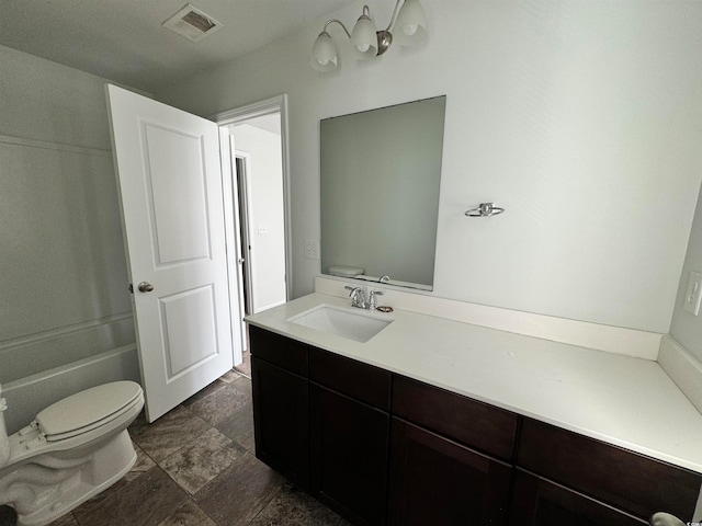 full bathroom with toilet, washtub / shower combination, vanity with extensive cabinet space, and tile flooring