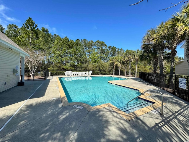 view of pool featuring a patio area