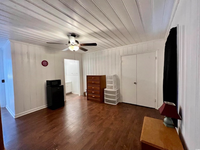 bedroom featuring dark wood-type flooring and ceiling fan