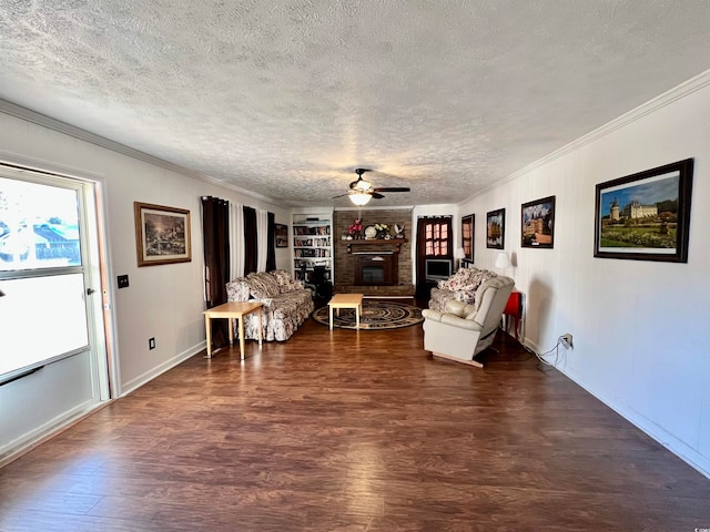 washroom with washer and dryer, dark wood-type flooring, hookup for an electric dryer, ornamental molding, and cabinets