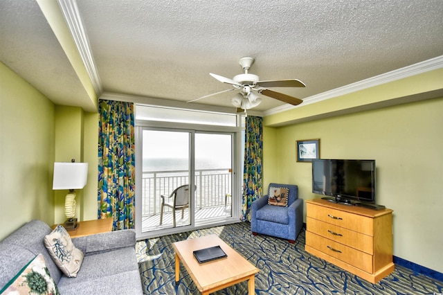 carpeted living room with crown molding, a textured ceiling, and ceiling fan