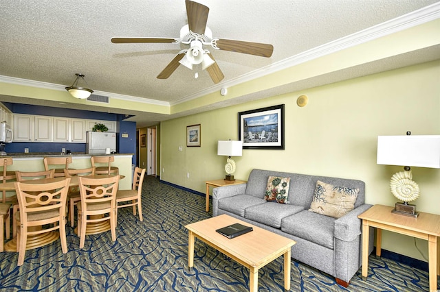 carpeted living room with a textured ceiling, crown molding, and ceiling fan