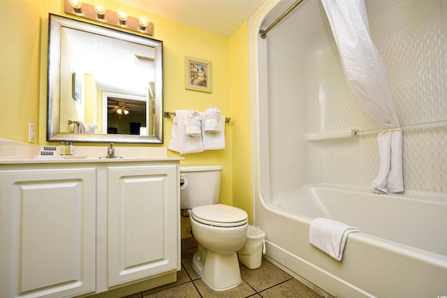 full bathroom featuring shower / washtub combination, toilet, tile flooring, and vanity