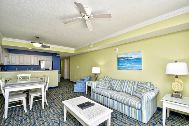 carpeted living room featuring ceiling fan, crown molding, and a textured ceiling