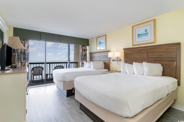 bedroom featuring light wood-type flooring