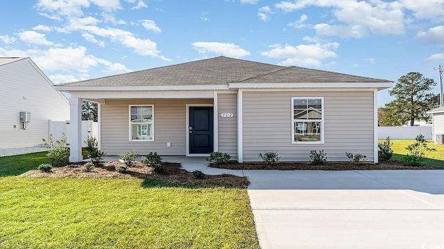 view of front of home with a front yard and a porch