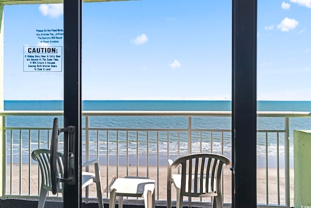 1105 S Ocean Blvd Unit 904, Myrtle Beach, SC 29577 - balcony featuring a water view and a view of the beach