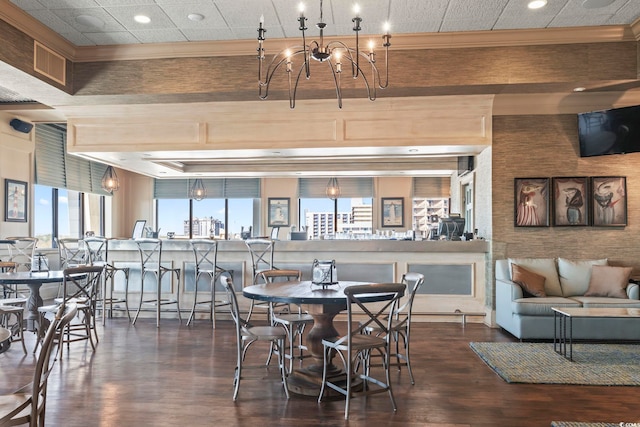 1105 S Ocean Blvd Unit 904, Myrtle Beach, SC 29577 - dining area with an inviting chandelier, ornamental molding, wood finished floors, and recessed lighting