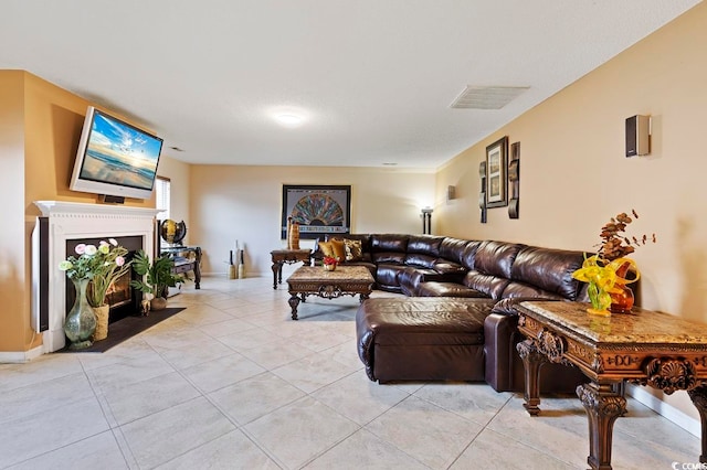 living room featuring light tile floors