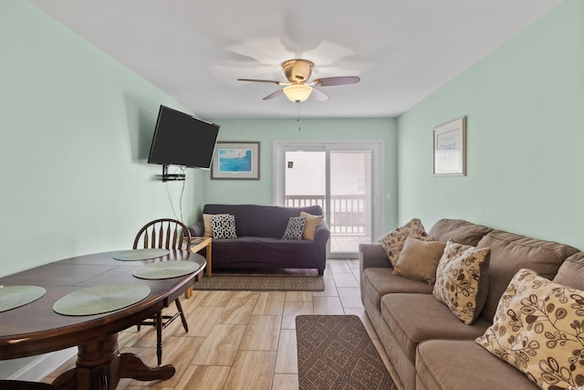 living room featuring ceiling fan