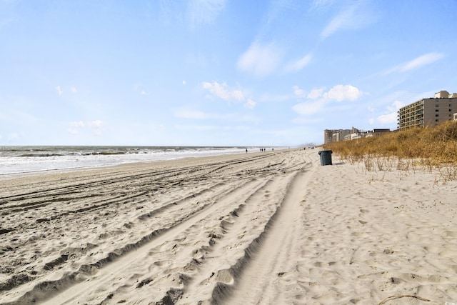 exterior space featuring a beach view