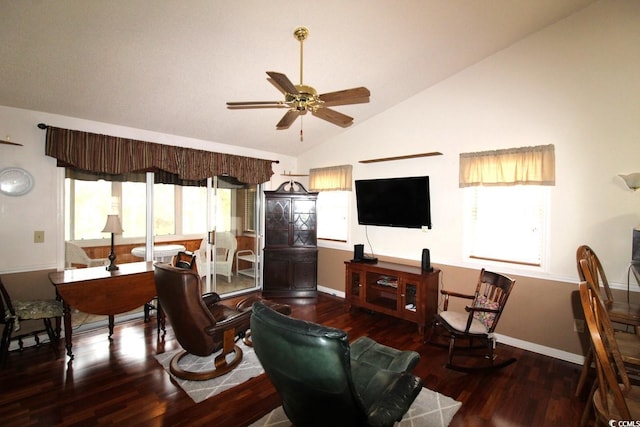 living room with hardwood / wood-style flooring, ceiling fan, and vaulted ceiling