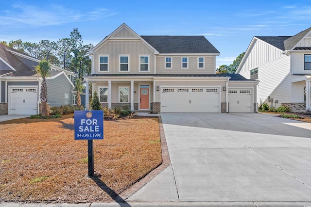 view of front of property featuring a garage