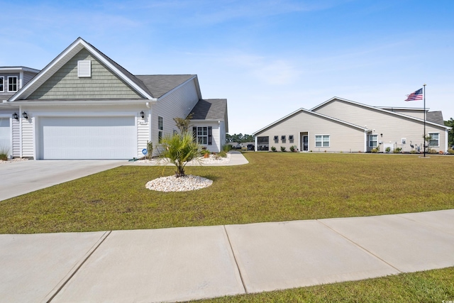 single story home with a garage and a front yard