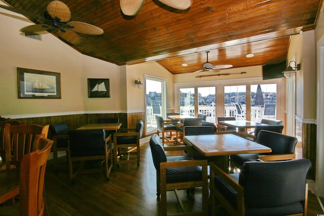 dining space featuring french doors, wood ceiling, ceiling fan, and dark hardwood / wood-style flooring