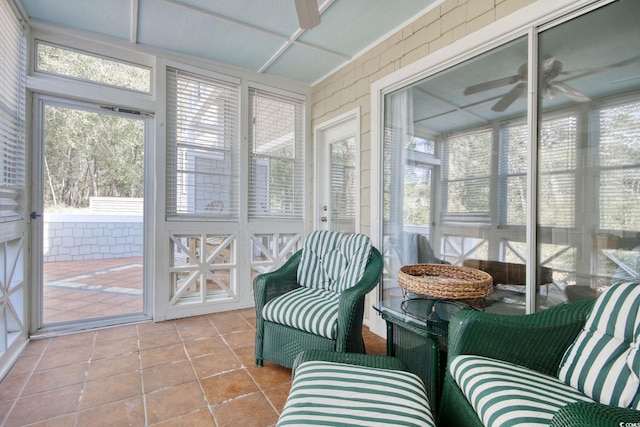 sunroom / solarium with ceiling fan