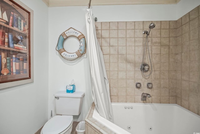 bathroom with crown molding, shower / bath combo with shower curtain, and toilet