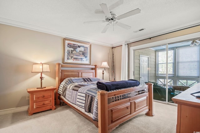 carpeted bedroom featuring crown molding, a textured ceiling, ceiling fan, and access to outside